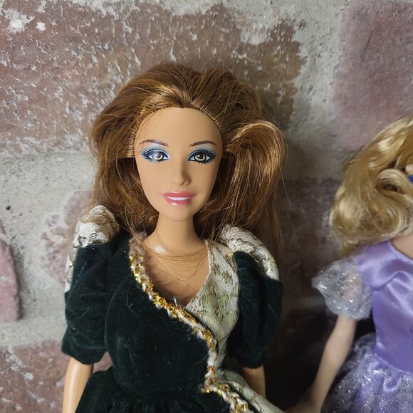 3 Barbie dolls wearing different dresses - Picture 2 of 5